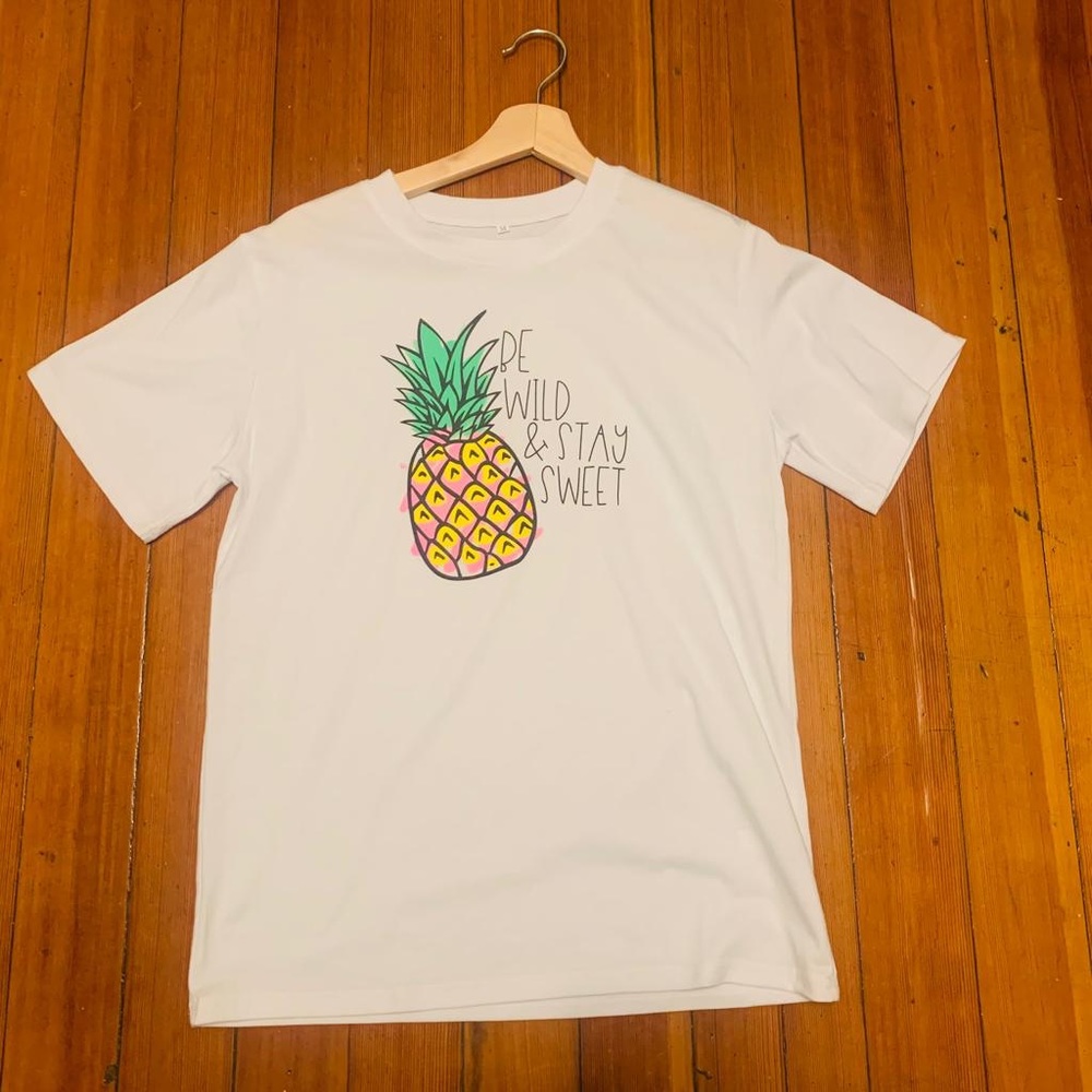 white t-shirt with pineapple print